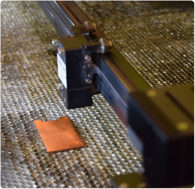 The laser prepares the copper surface for texturing and enhances its antimicrobial properties. (Photo from Purdue University / Kayla Wiles)